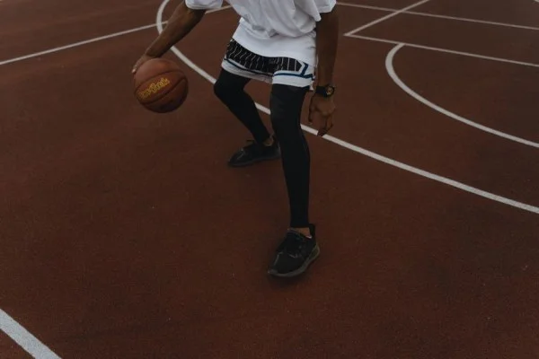 basketball point guard dribbling court